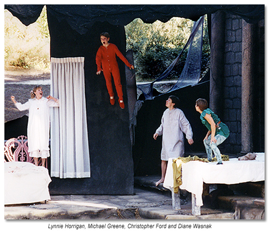 Peter Pan watches as Wendy, Michael and John fly with happy thoughts, in Peter Pan - Marin Shakespeare 1996